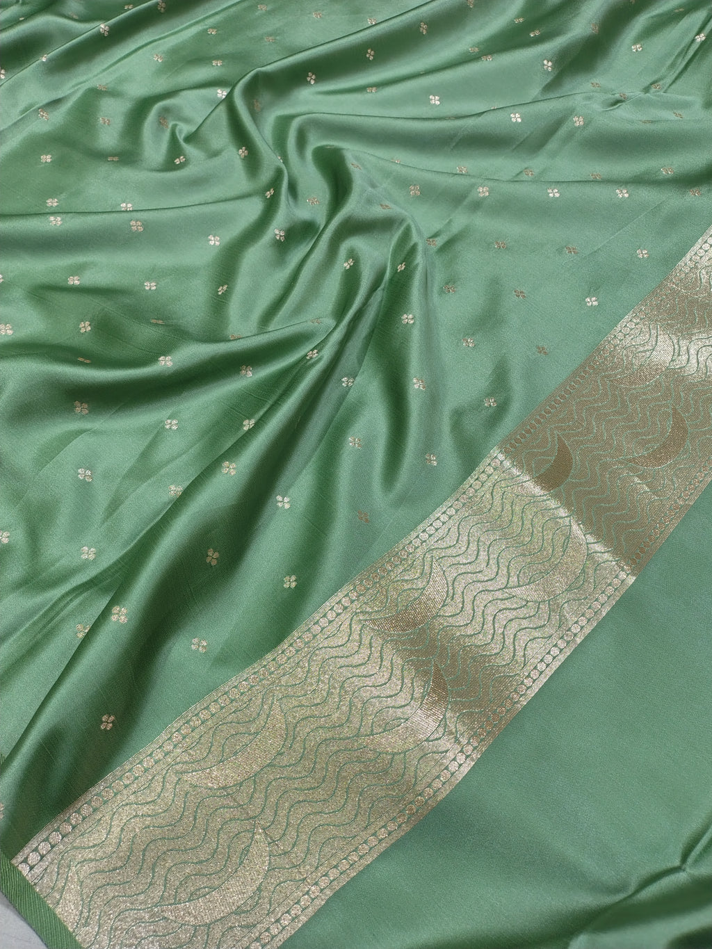 Pista Green Mashru Silk Saree with Ghat Design & Zari Work